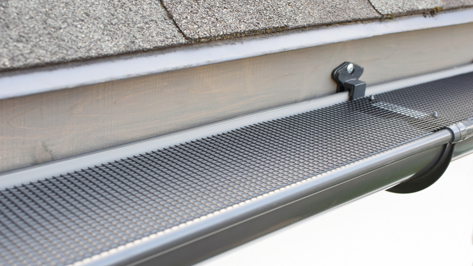 Gutter guards installed on roof edge
